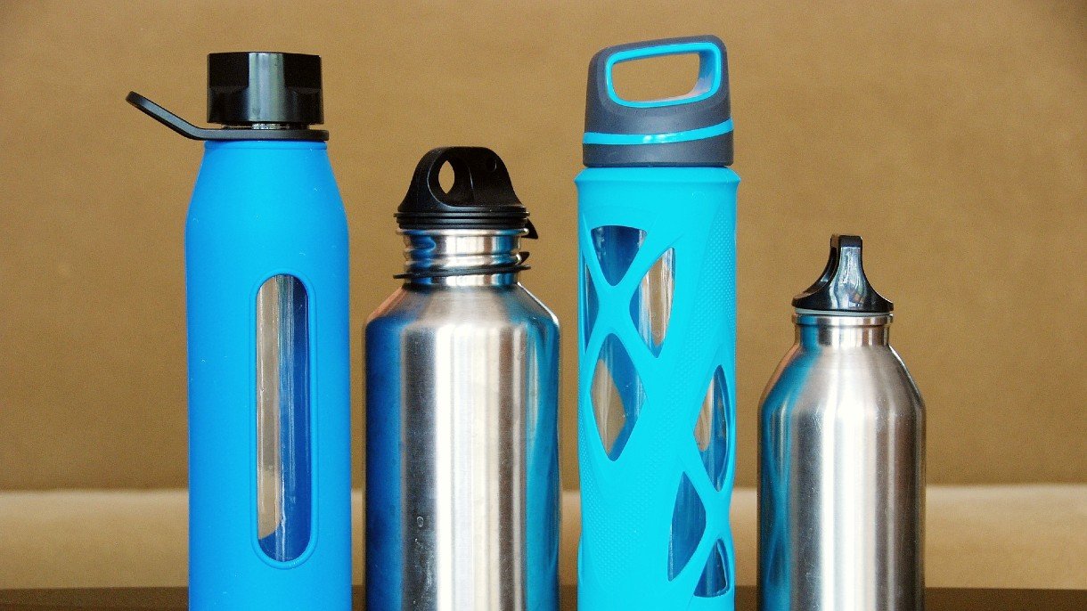 four different reusable water bottles