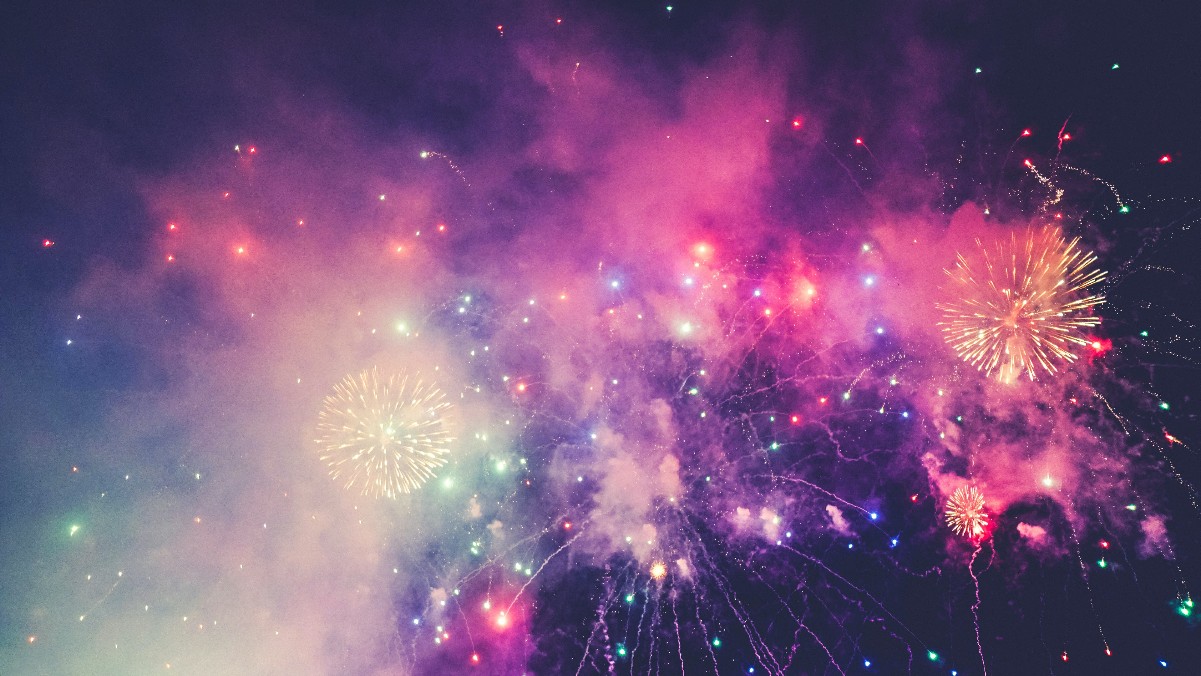 pink fireworks exploding in the sky