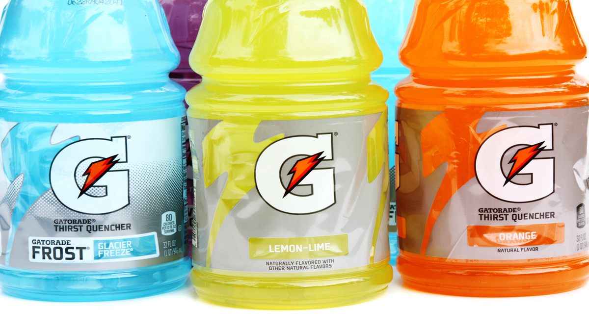 Assortment of three different flavored Gatorade sports drinks., recycle Gatorade bottles